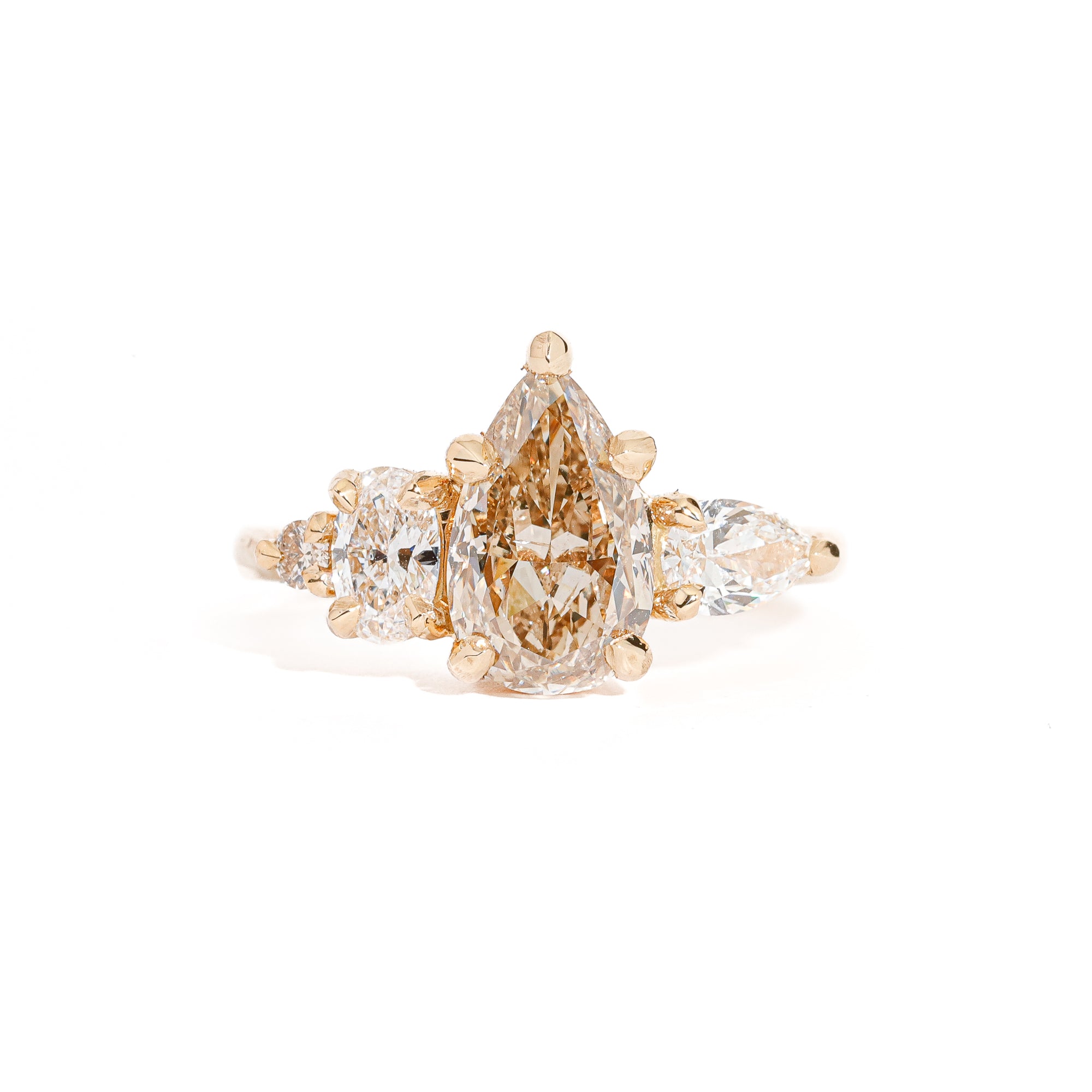 Pear Cut Champagne Diamond with Pear and Round Brilliant Cut White Diamond Side Stones in 18 Carat Yellow Gold