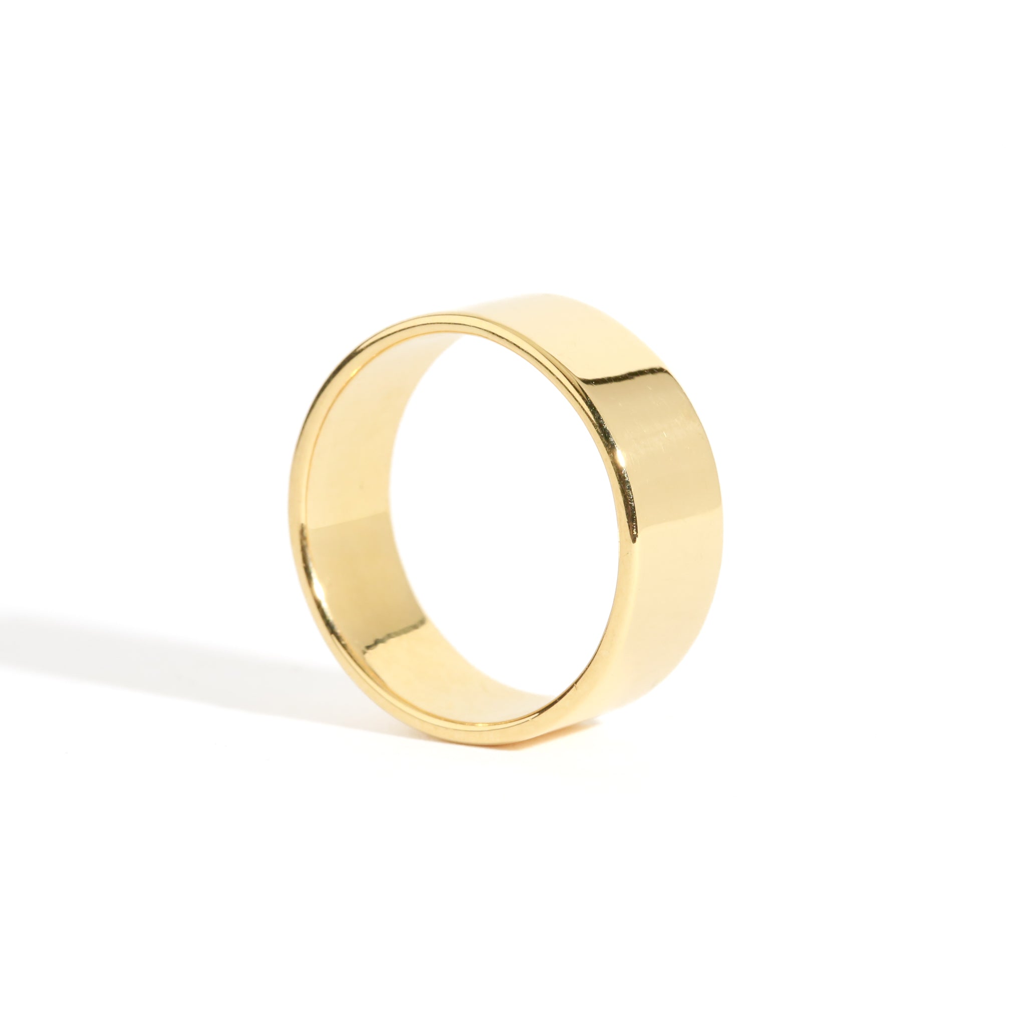 Handmade cigar wedding band, shown in 18 carat yellow gold.