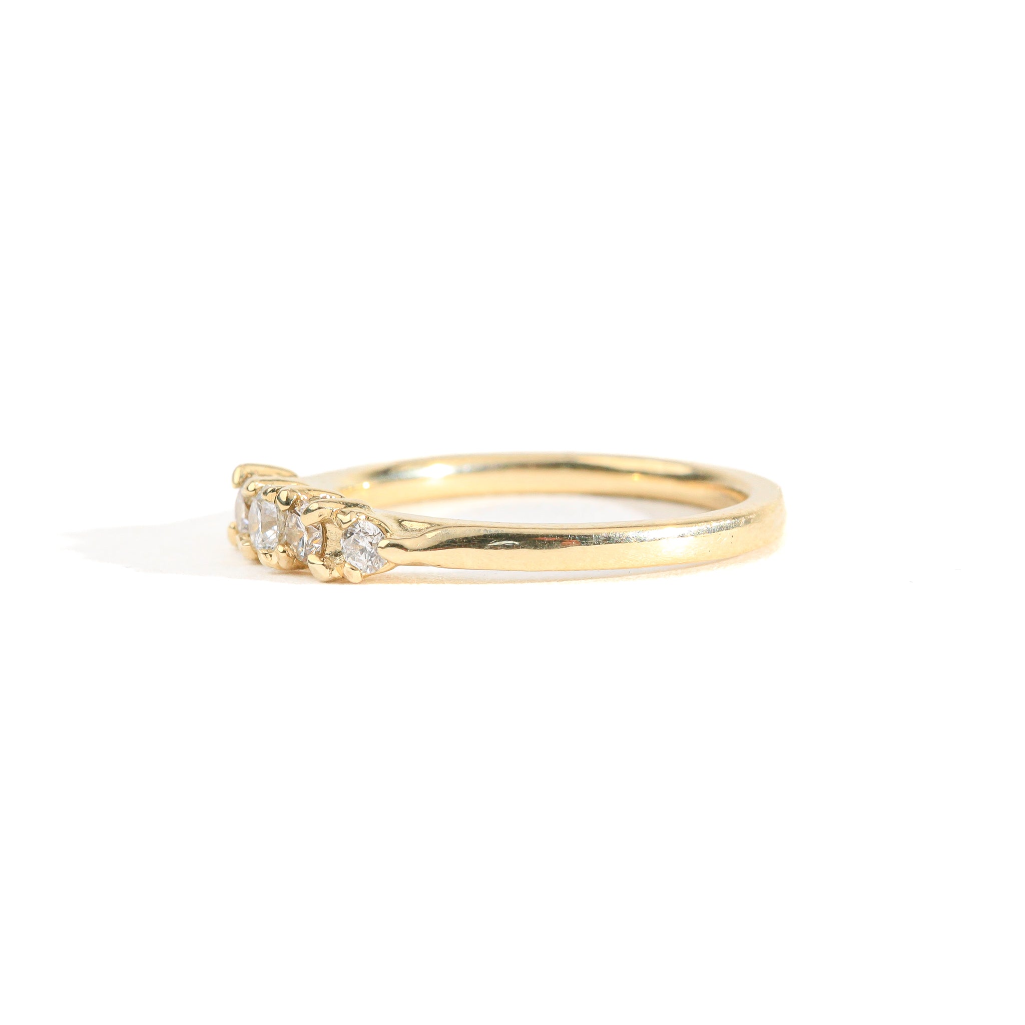 Hand crafted yellow gold five stone champagne diamond ring. 