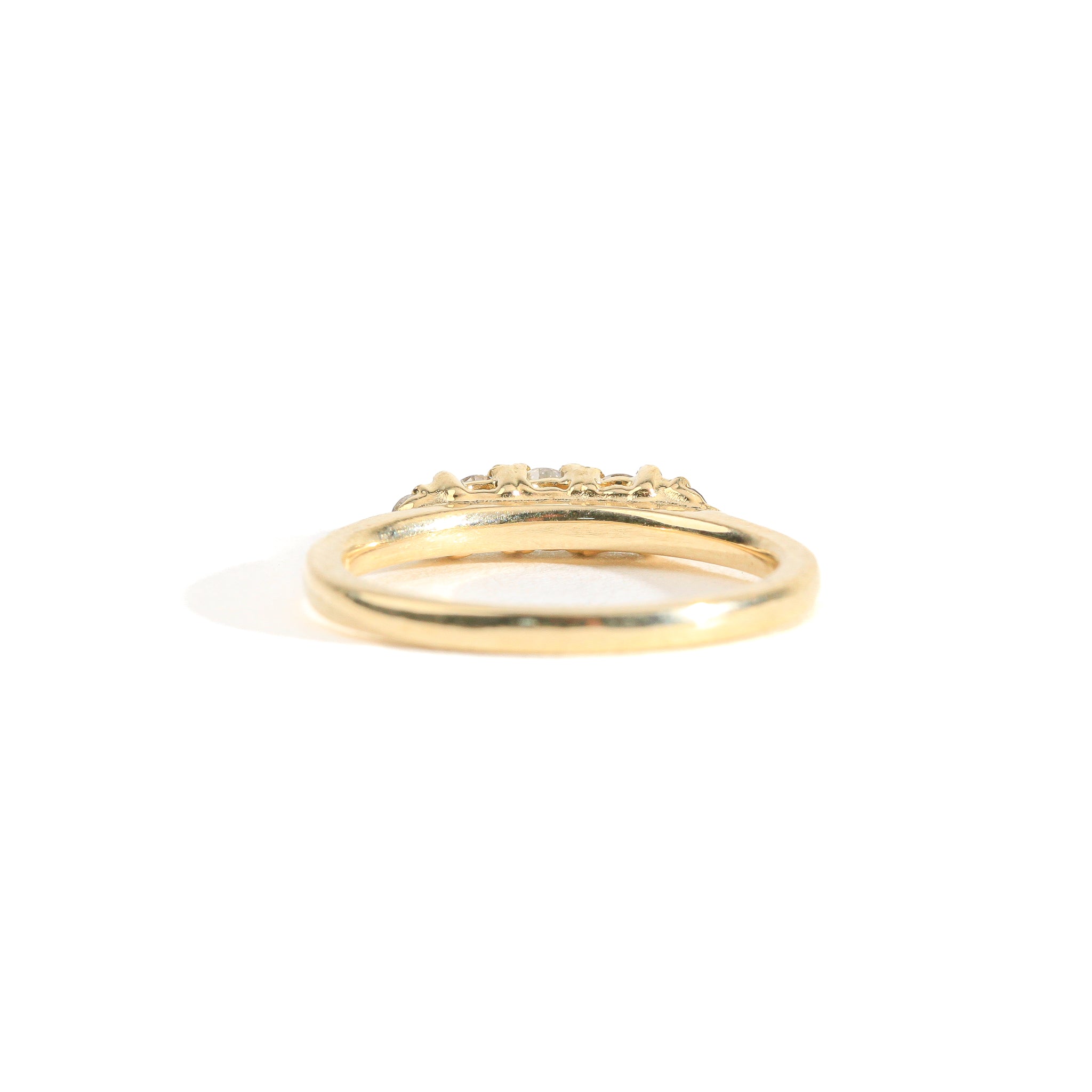 Hand crafted yellow gold five stone champagne diamond ring. 