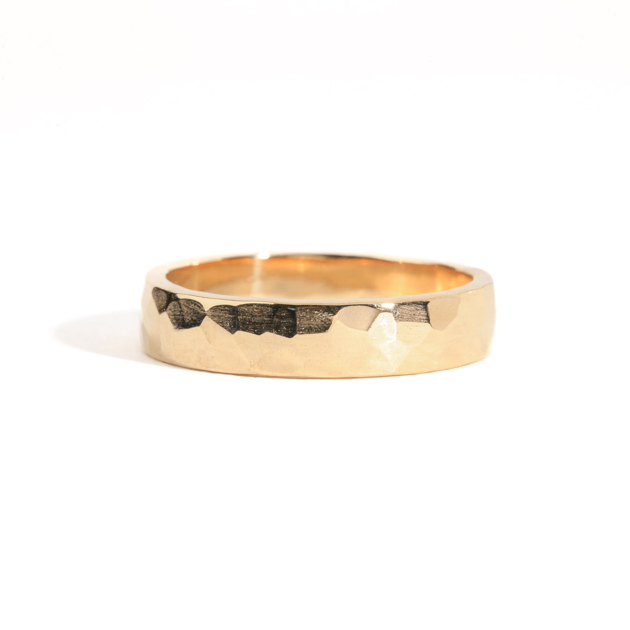 Men's wedding band in 18ct yellow gold with a soft chiseled finish, Custom bespoke handmade jewellery.