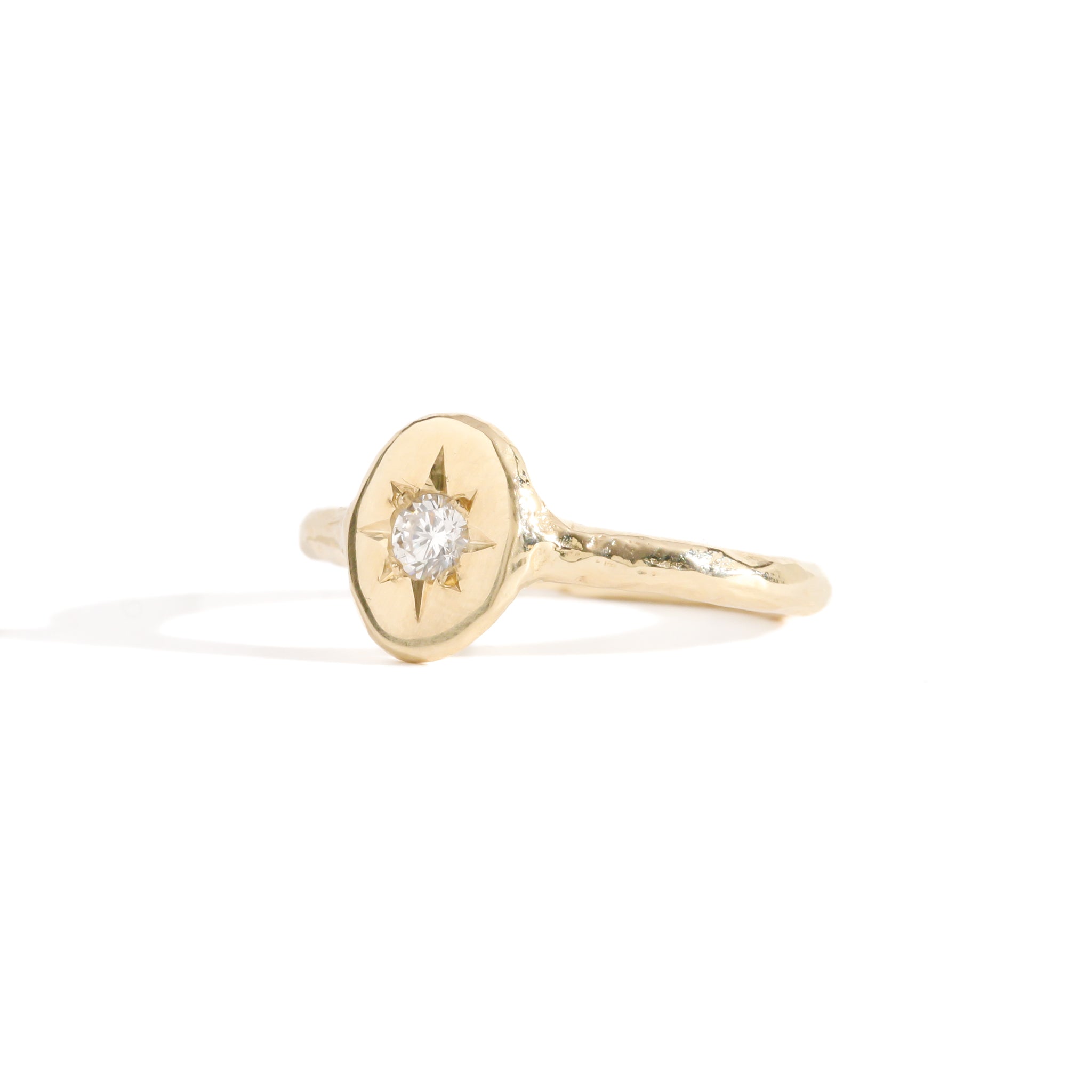 9ct yellow gold signet ring with star set diamond in centre. Bespoke and handmade in Melbourne by Black Finch Jewellery