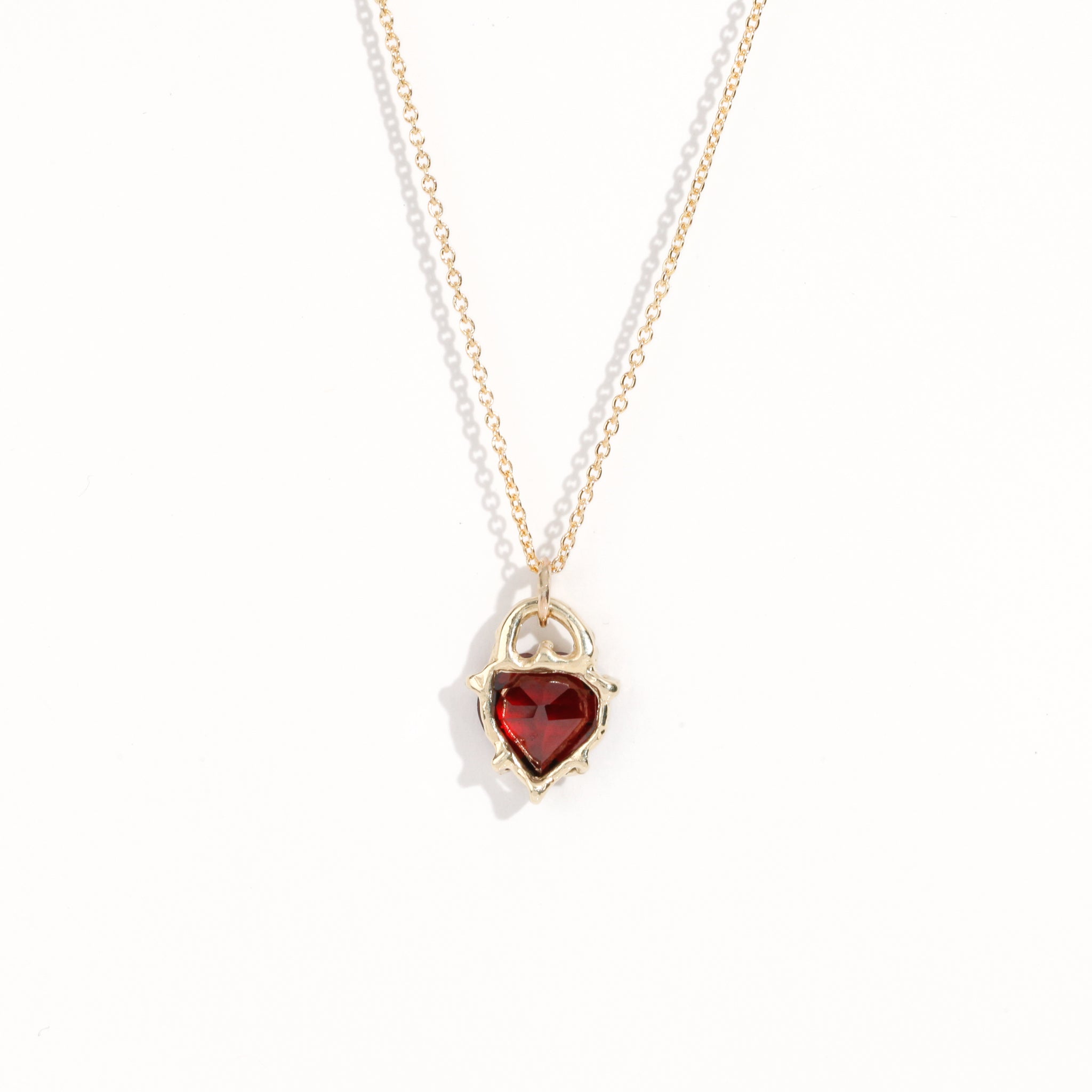 Made in Melbourne, bespoke 9ct yellow gold garnet heart pendant necklace on 9ct gold chain.