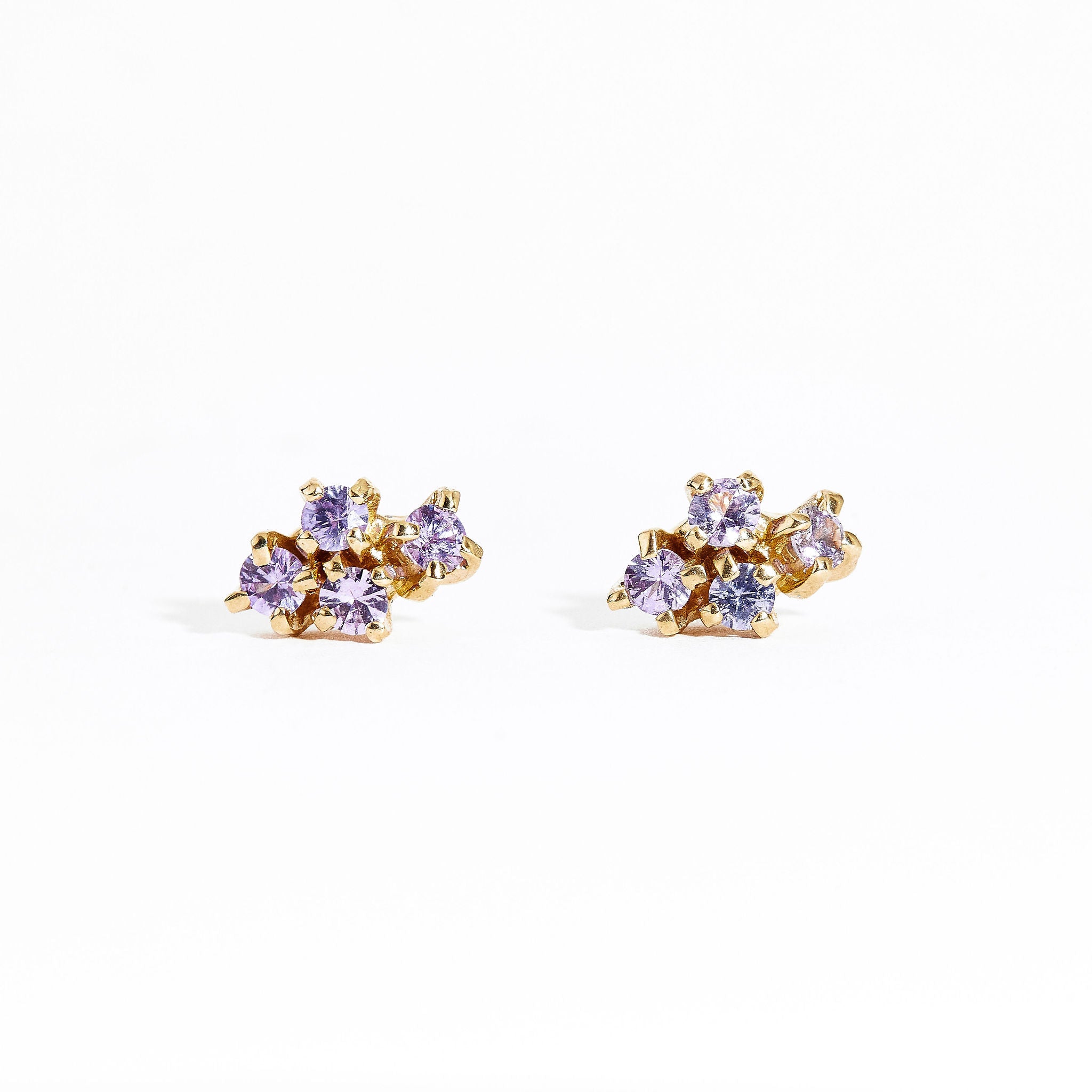  Pair of gold studs featuring four lilac sapphires. Bespoke and handmade in Melbourne by Black Finch Jewellery.