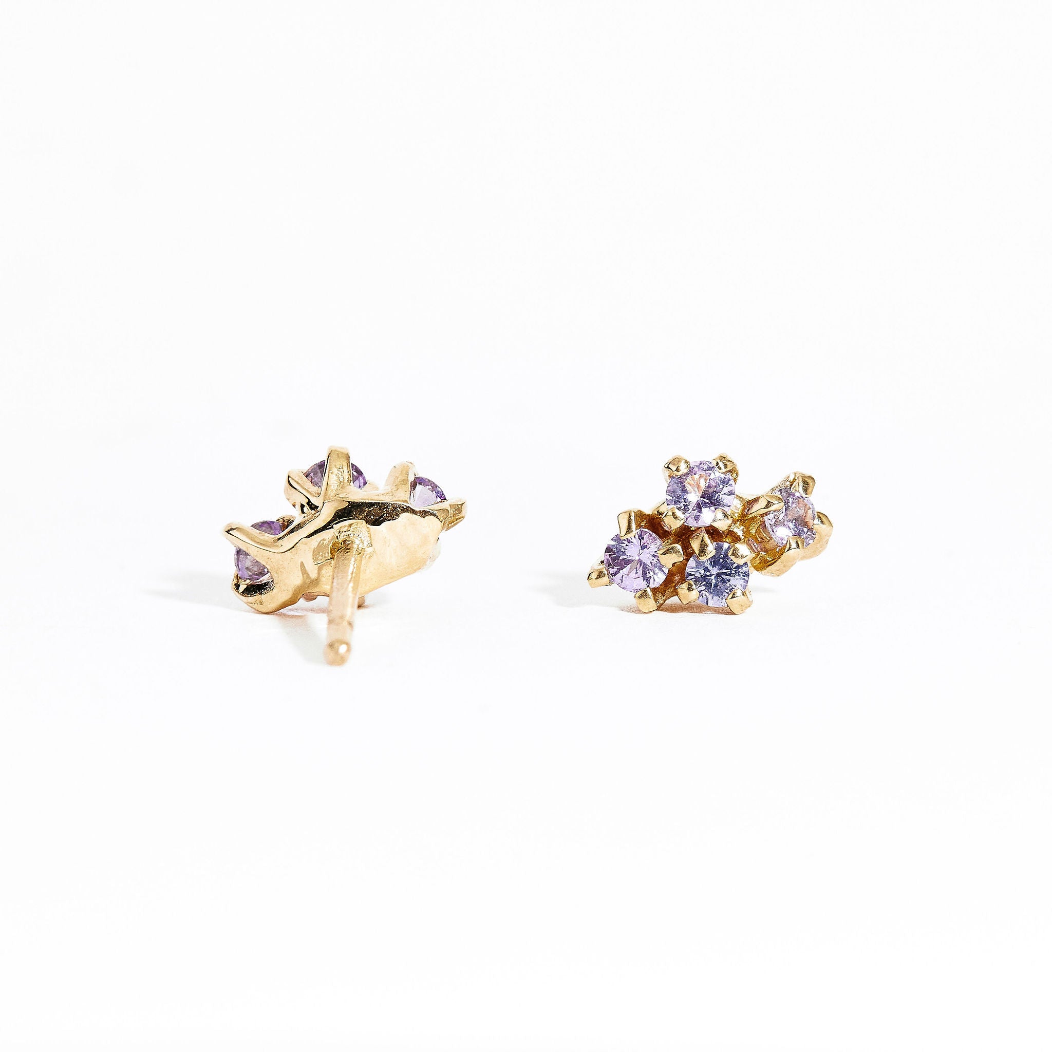  Pair of gold studs featuring four lilac sapphires. Bespoke and handmade in Melbourne by Black Finch Jewellery.