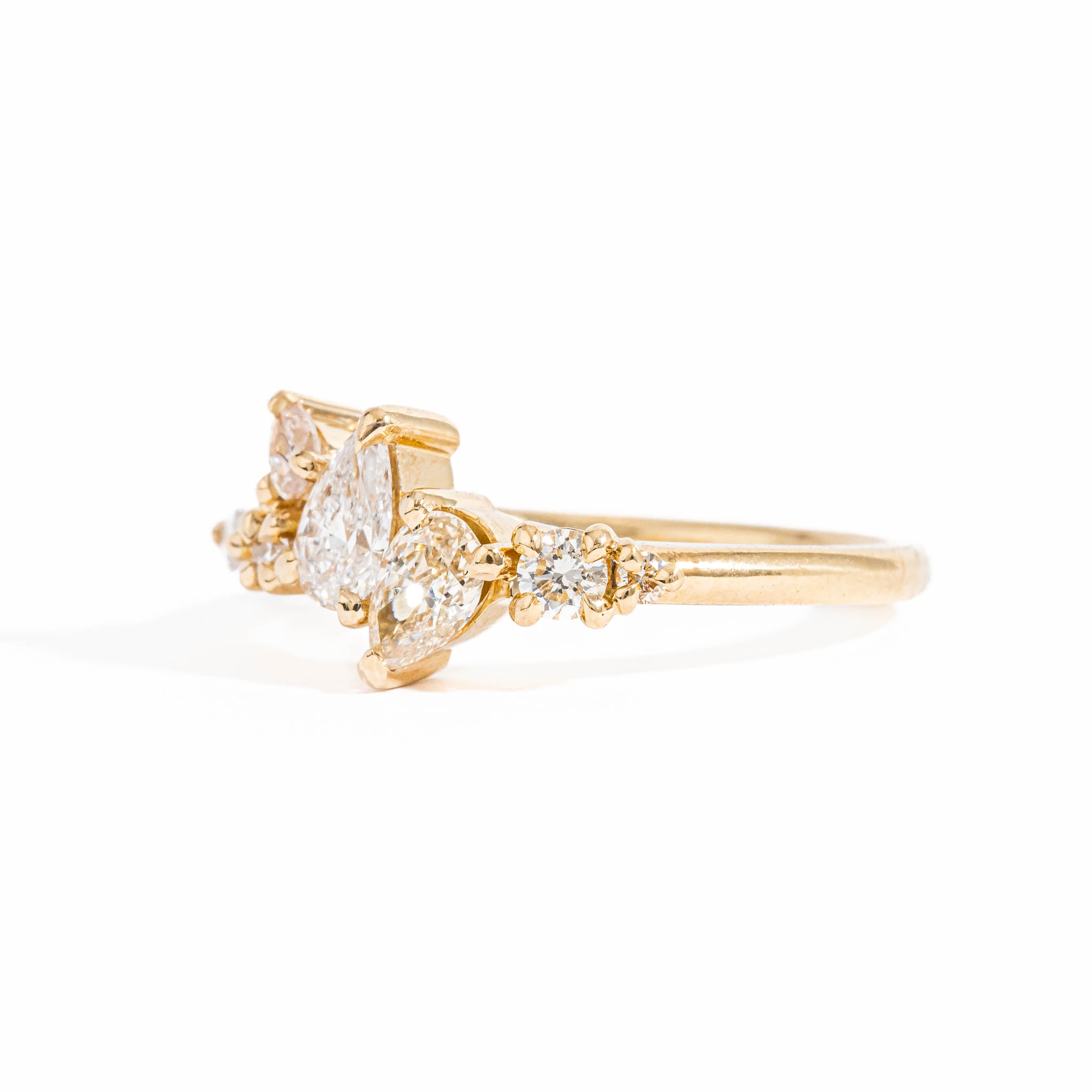 Seven Stone Diamond Ring with Two Pear Cut Diamonds in 18 Carat Yellow Gold